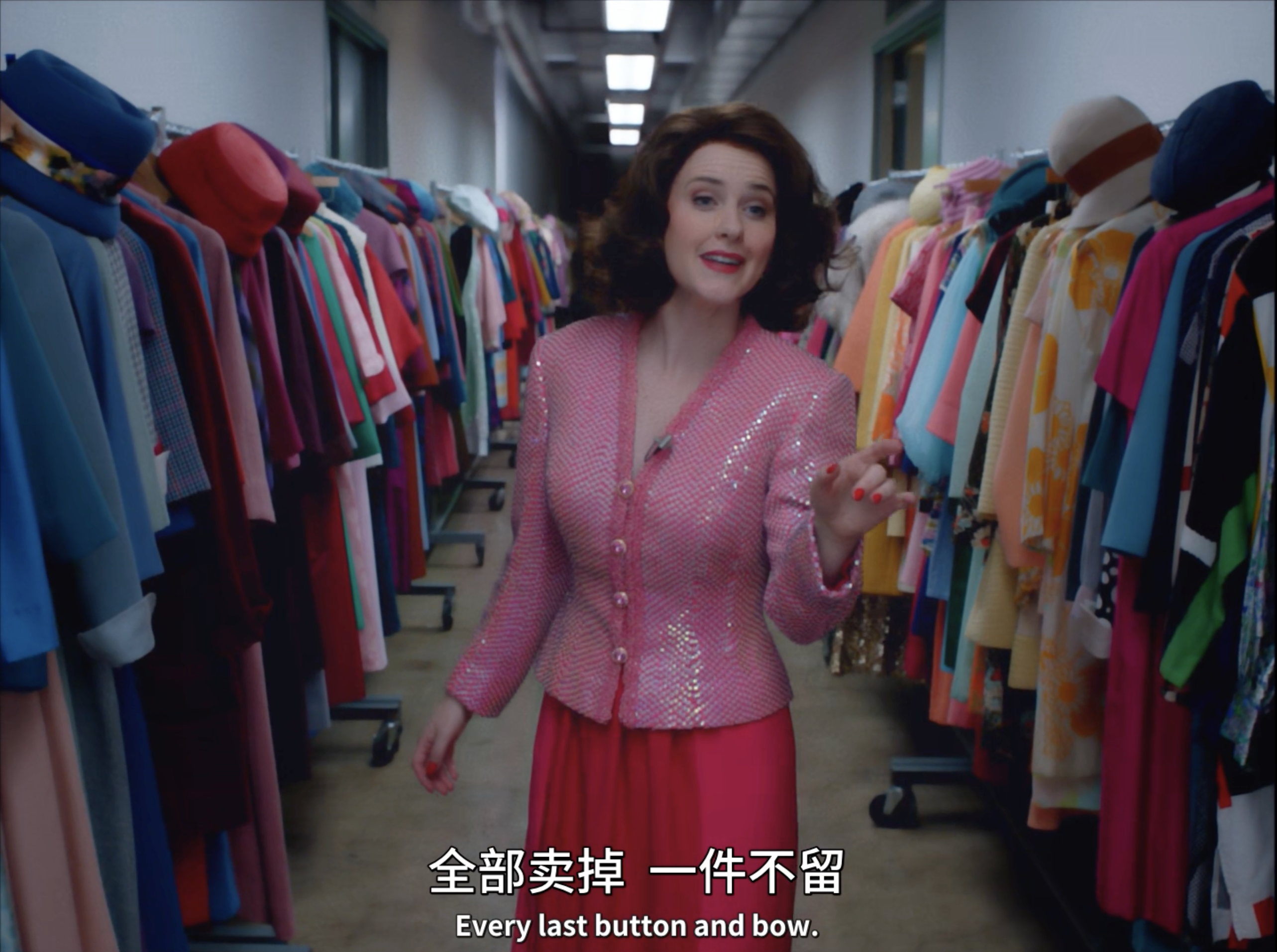 S5E02. The then-famous Midge announced that she will auction all her clothes for charity, walking down a long isle to cutely addressing the maximalism of her wardrobe.