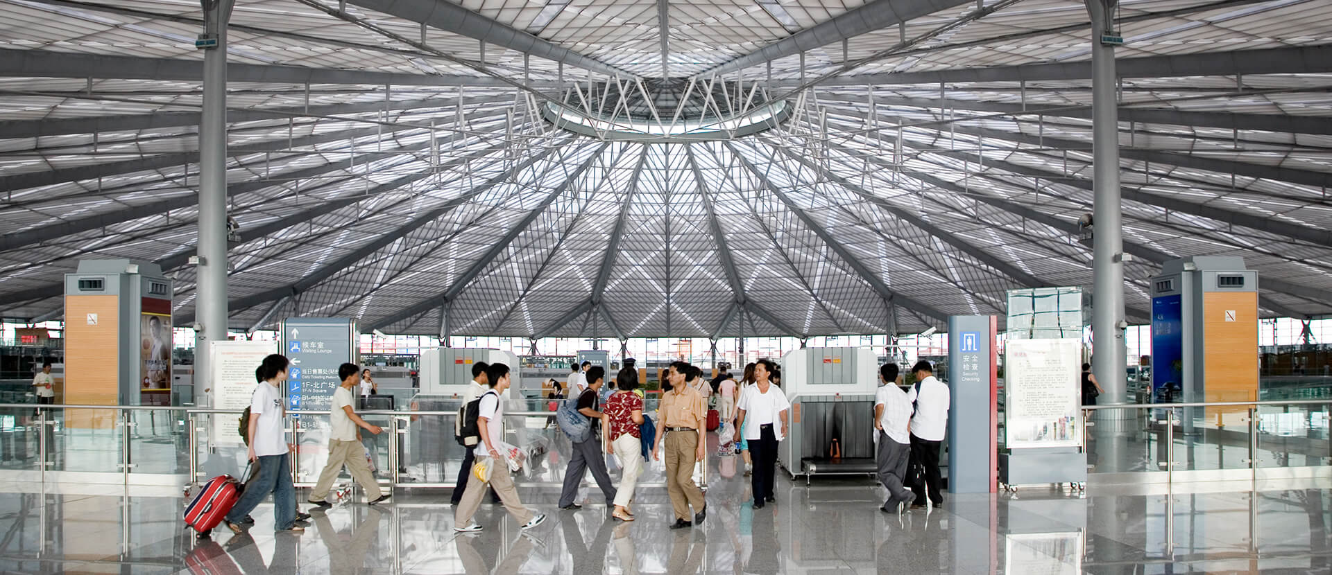 Source: ArchDaily Descending into the middle, lower sink for waiting areas in front of the gates